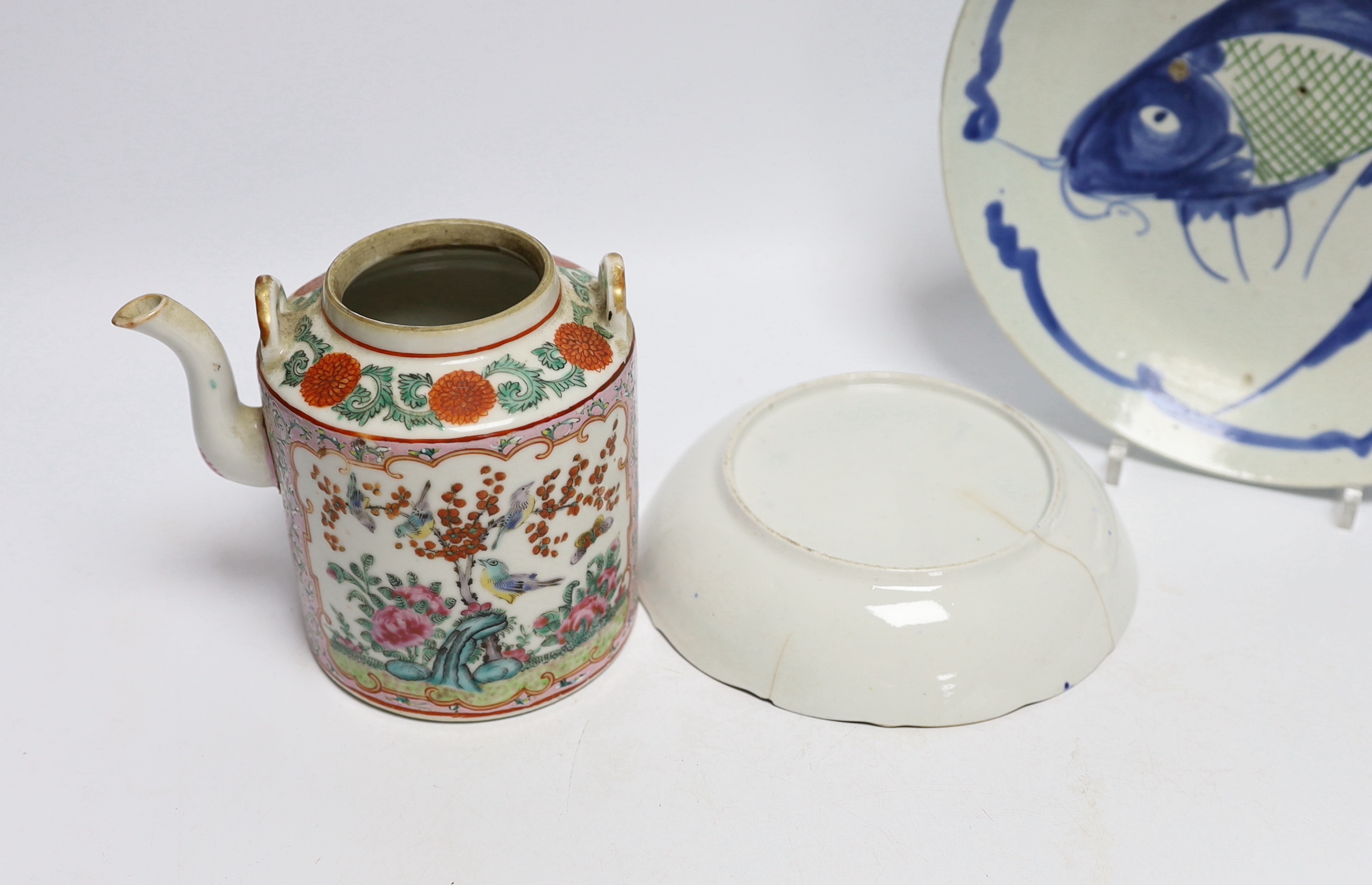 A Chinese famille rose teapot, a bowl and two dishes, bowl 24.5cm diameter